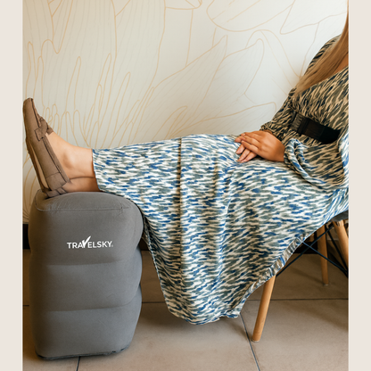 reposapies inflable airrest en uso para descanso de piernas